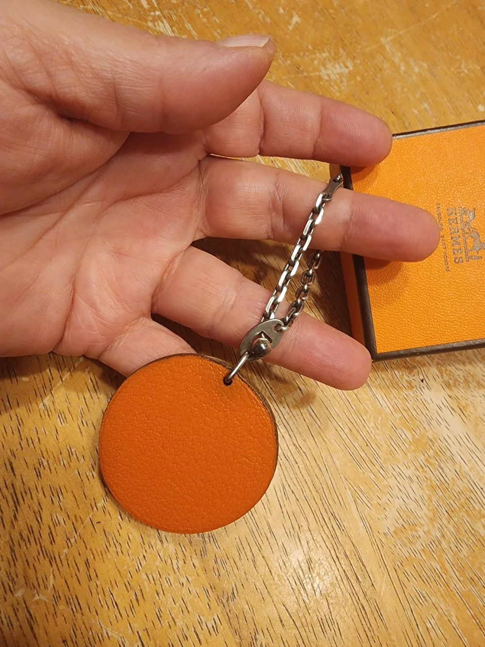 authentic Hermès orange fruit leather bag charm and keychain